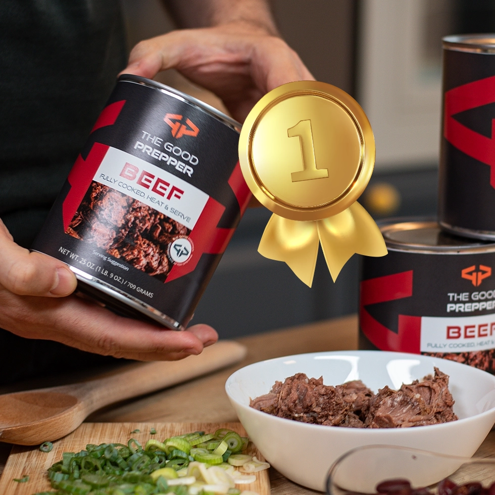 Smiling woman holding the The Good Prepper canned beef into both hands